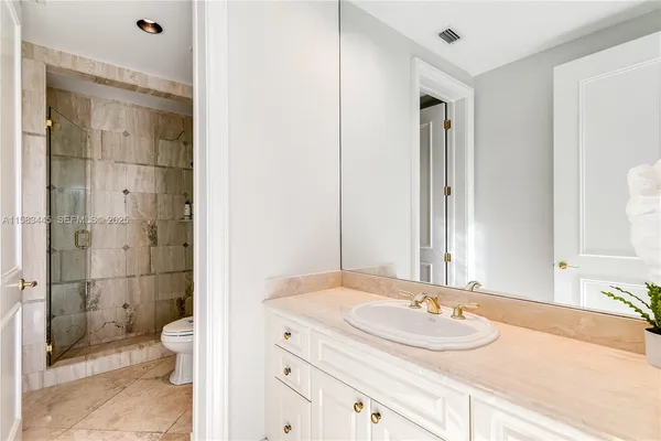 a bathroom with a sink a toilet and a bathtub