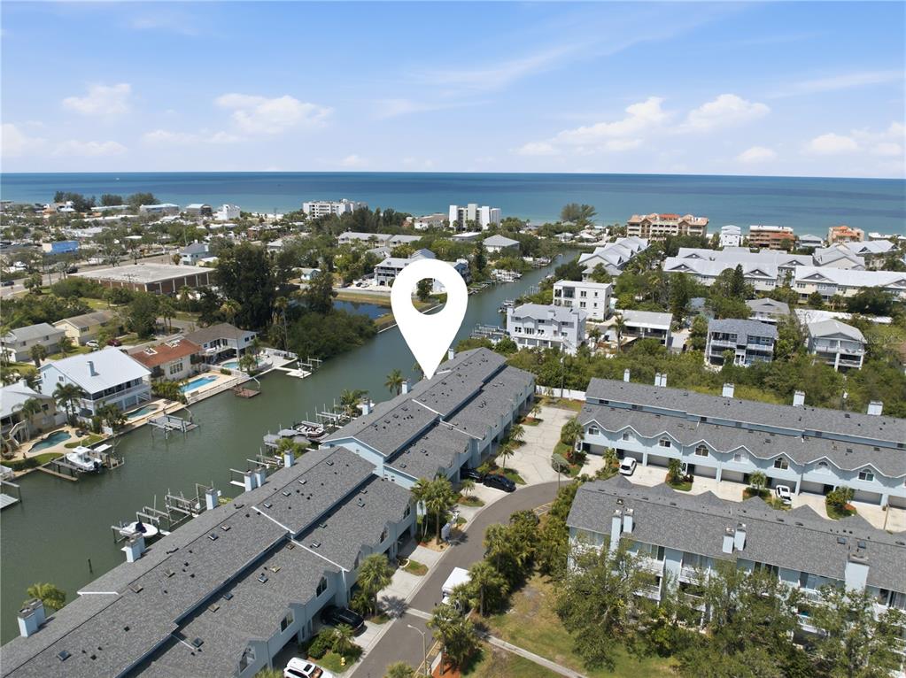 643 Garland Circle Indian Rocks Beach, FL 33785 - Photo 65 of 81 an aerial view of a city with ocean view