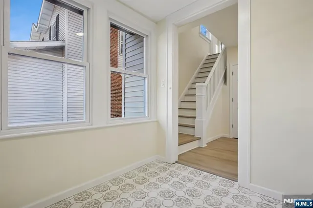a view of an entryway with staircase