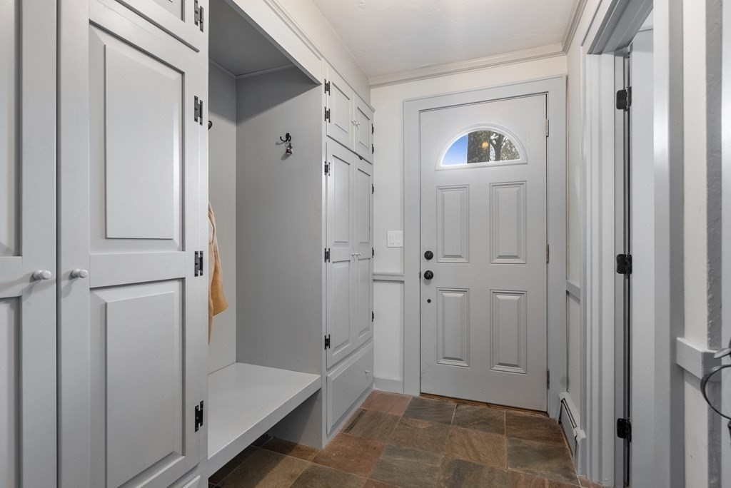 6 Highland Road Acton, MA 01720 - Photo 4 of 35 a view of a hallway with a door and closet
