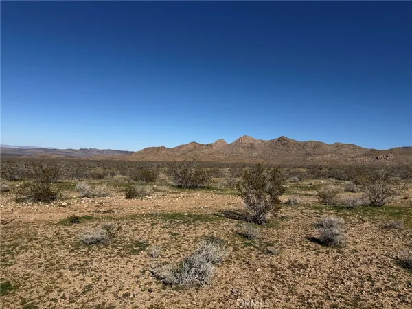 a view of an outdoor space with mountain view
