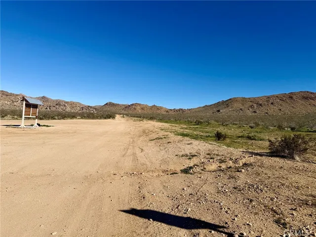 a view of lake and mountain