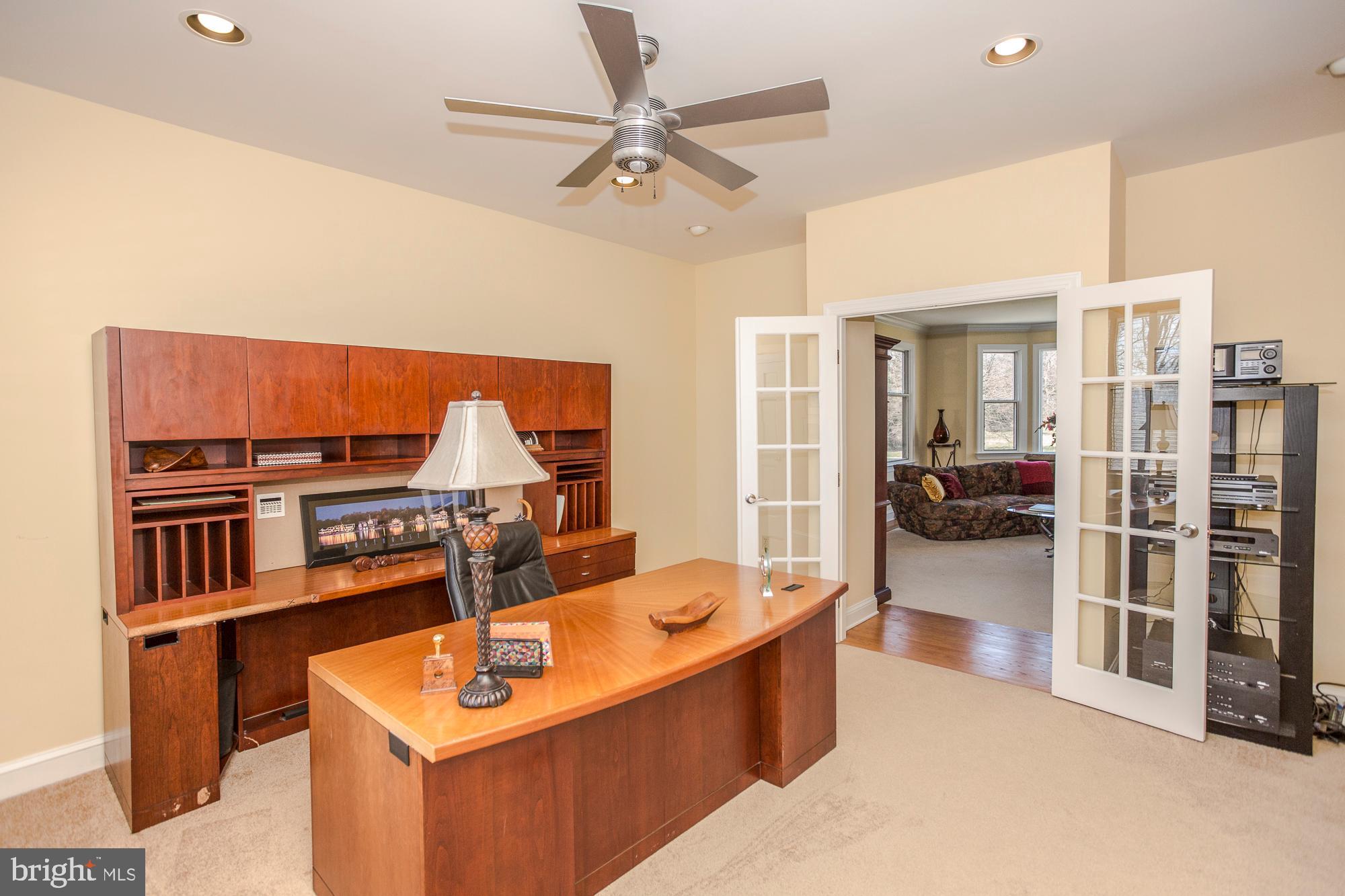 2565 Cold Spring Road Lansdale, PA 19446 - Photo 11 of 61 a view of a kitchen with kitchen island a large counter top space a sink stainless steel appliances and cabinets