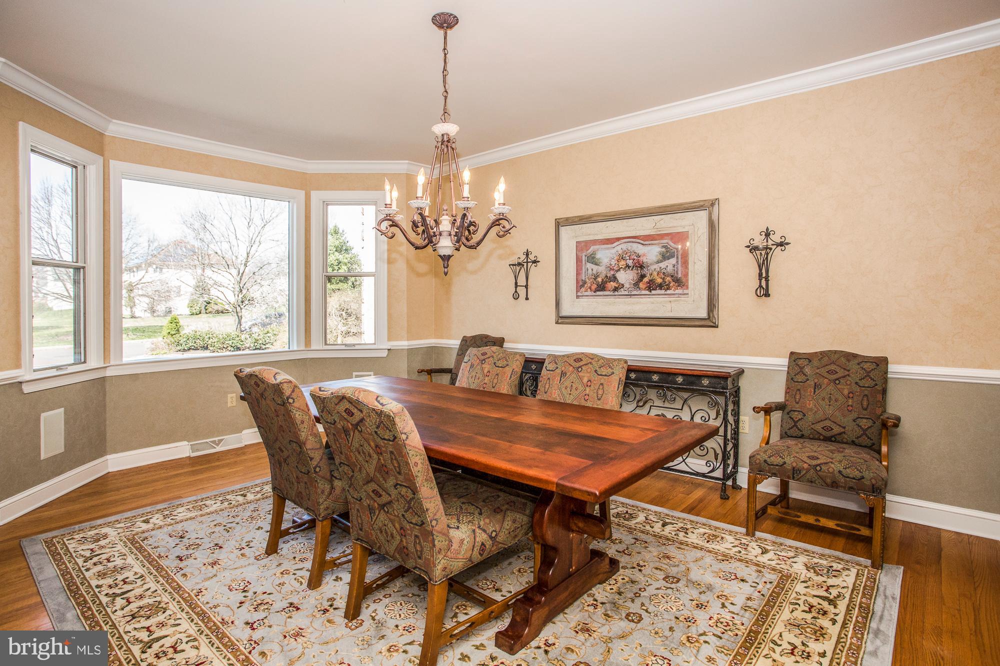 2565 Cold Spring Road Lansdale, PA 19446 - Photo 15 of 61 a dining room with furniture a rug and a chandelier