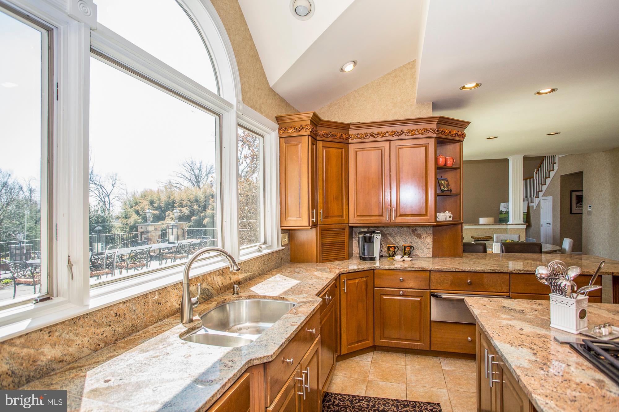 2565 Cold Spring Road Lansdale, PA 19446 - Photo 17 of 61 a large kitchen with kitchen island a large window in it and living room