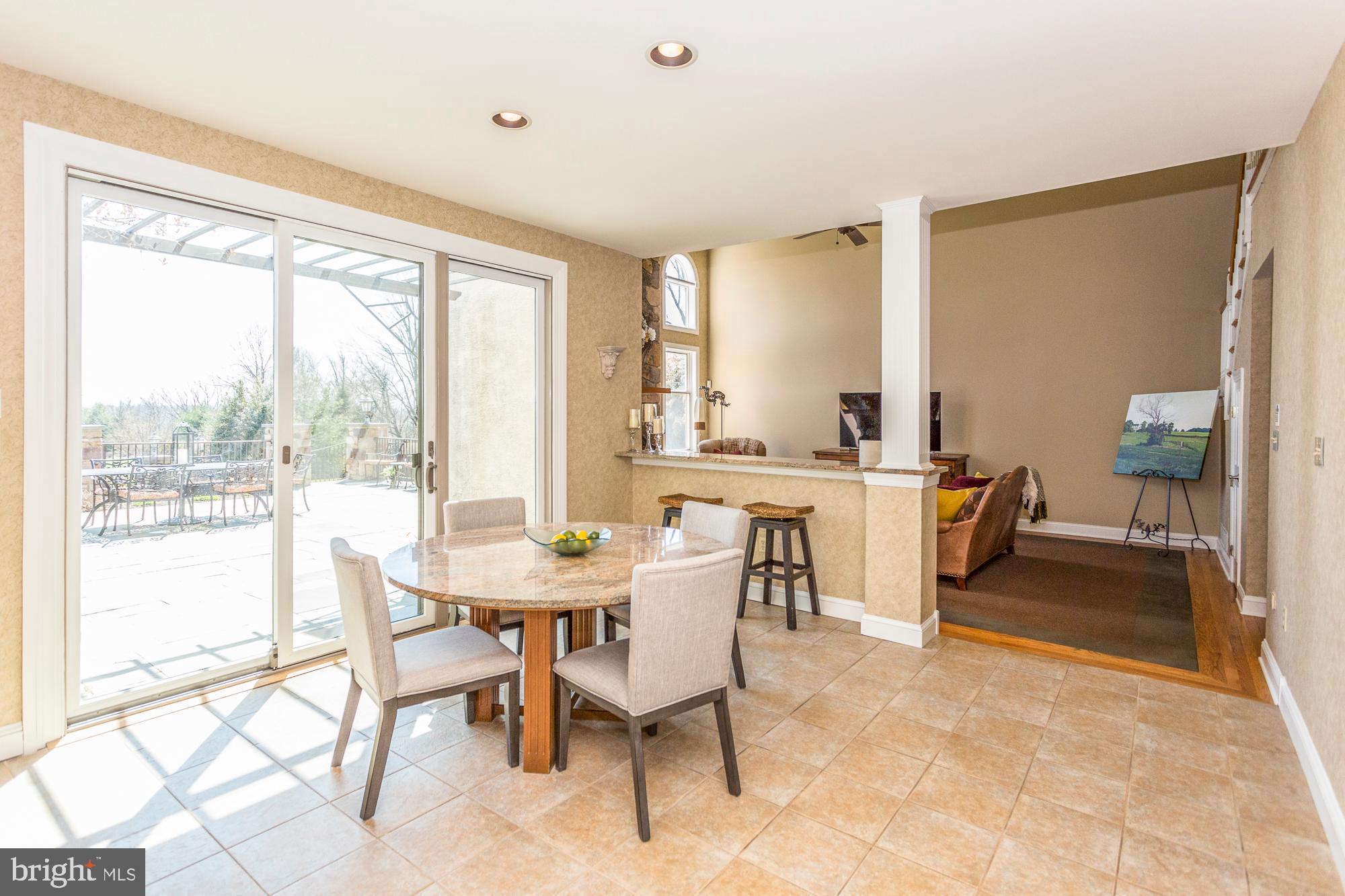 2565 Cold Spring Road Lansdale, PA 19446 - Photo 18 of 61 a view of a dining room with furniture and a large window