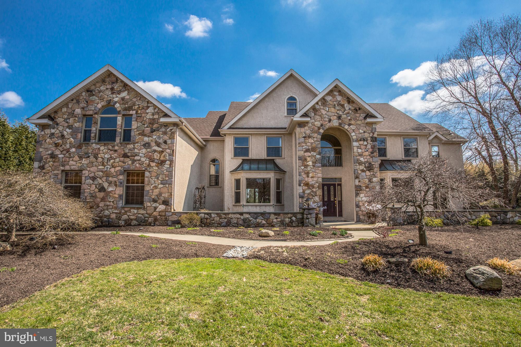 2565 Cold Spring Road Lansdale, PA 19446 - Photo 3 of 61 a front view of a house with a yard