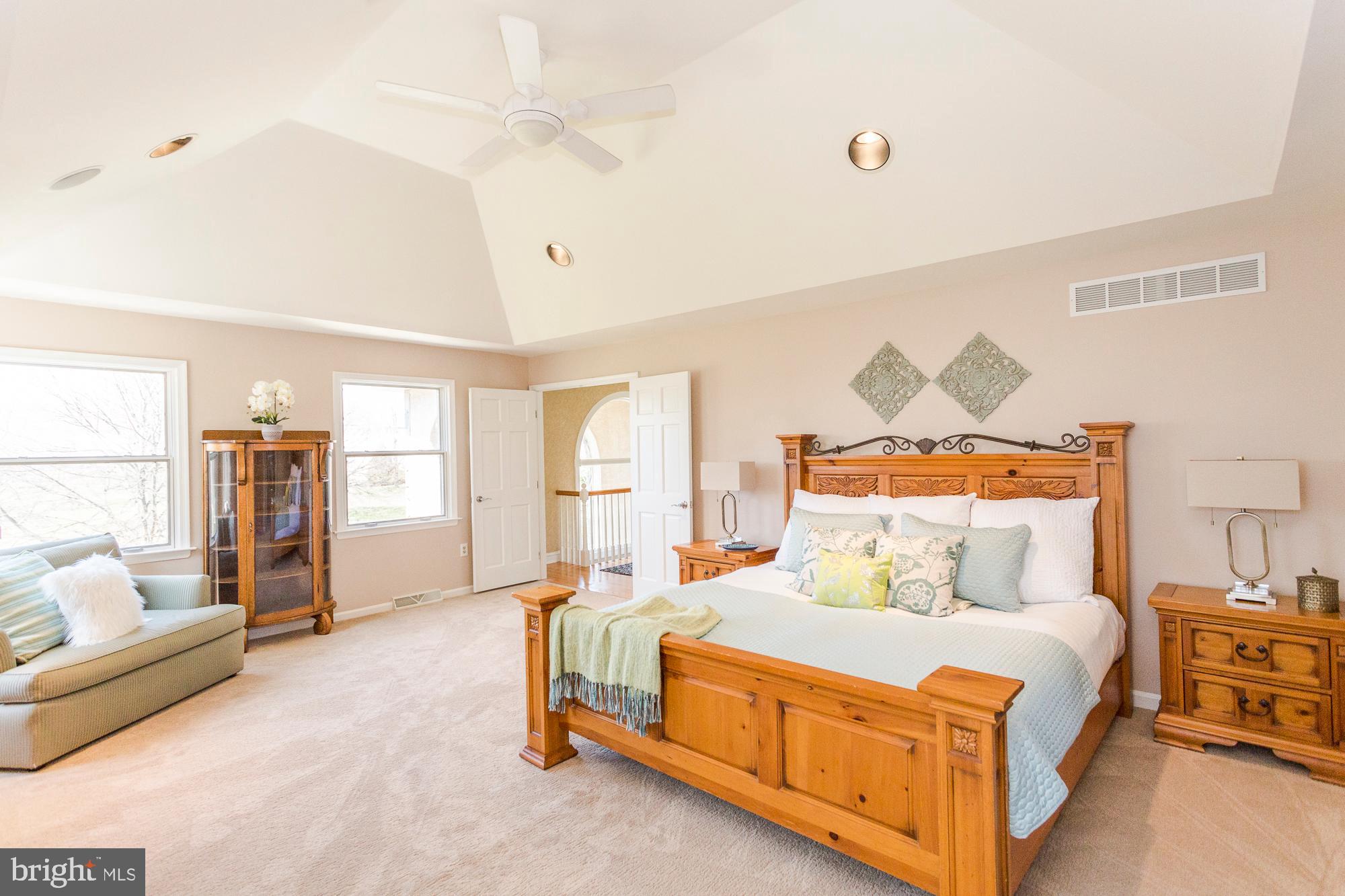 2565 Cold Spring Road Lansdale, PA 19446 - Photo 28 of 61 a bedroom with a bed and a couch