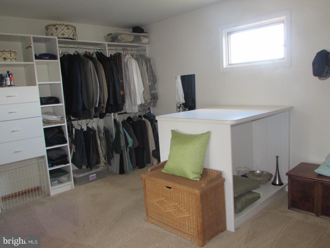 2565 Cold Spring Road Lansdale, PA 19446 - Photo 29 of 61 a view of walk in closet with clothes and shoes