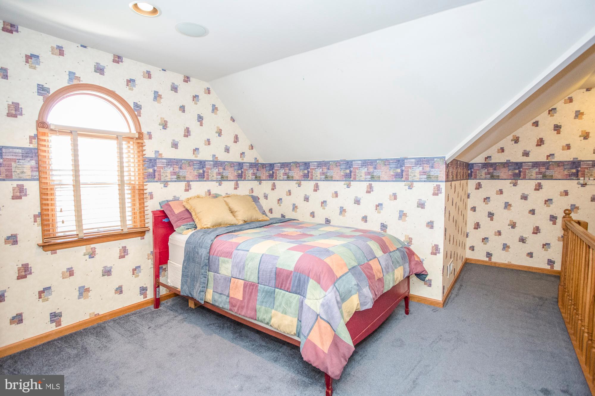 2565 Cold Spring Road Lansdale, PA 19446 - Photo 44 of 61 a bedroom with a bed and a window