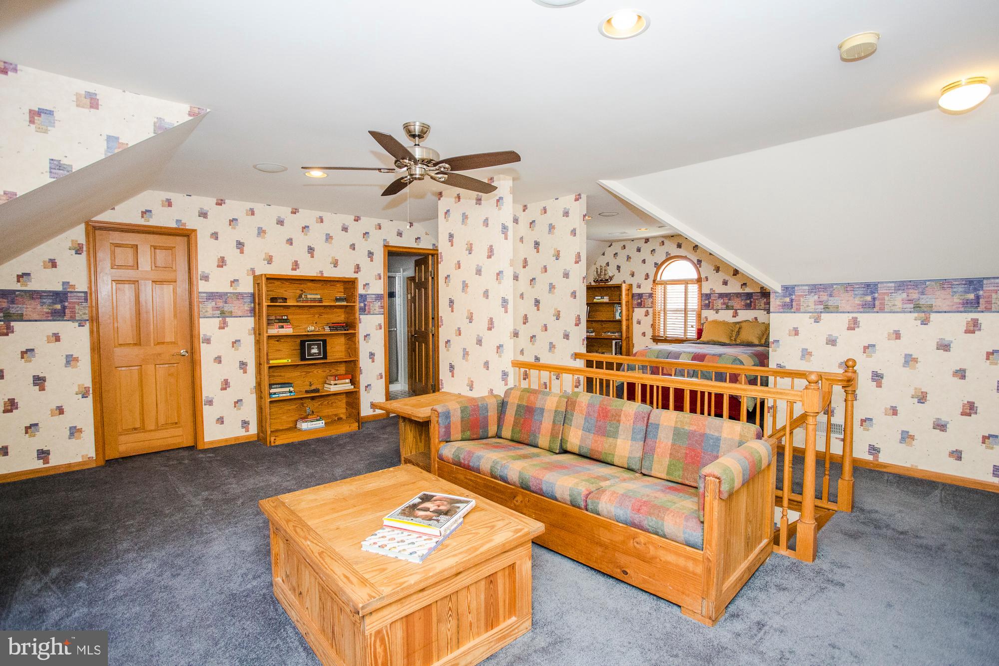 2565 Cold Spring Road Lansdale, PA 19446 - Photo 45 of 61 a living room with furniture and a baby crib