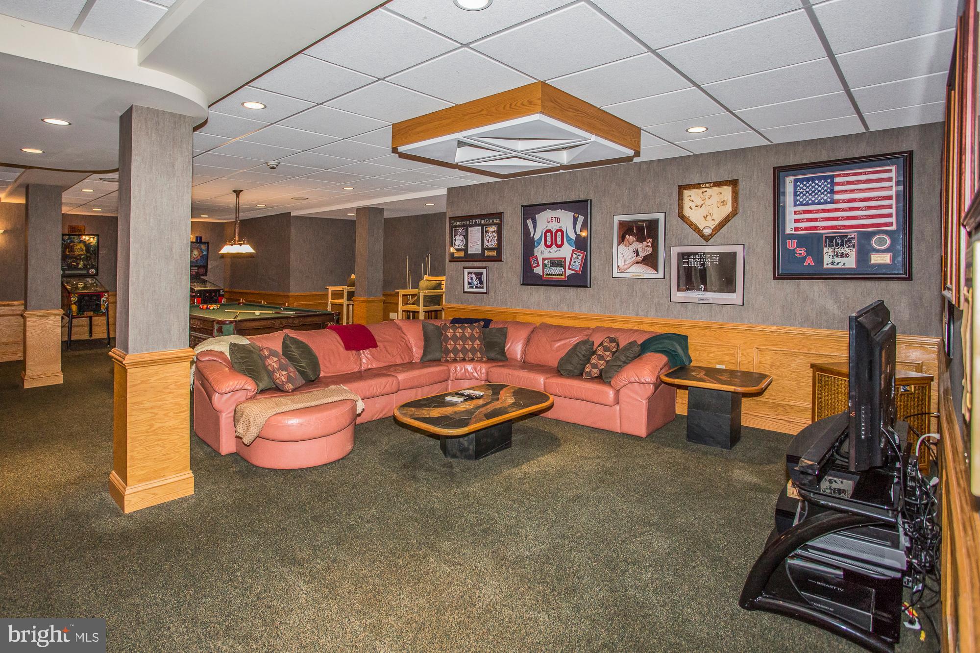 2565 Cold Spring Road Lansdale, PA 19446 - Photo 48 of 61 a living room with lots of furniture and air hockey table