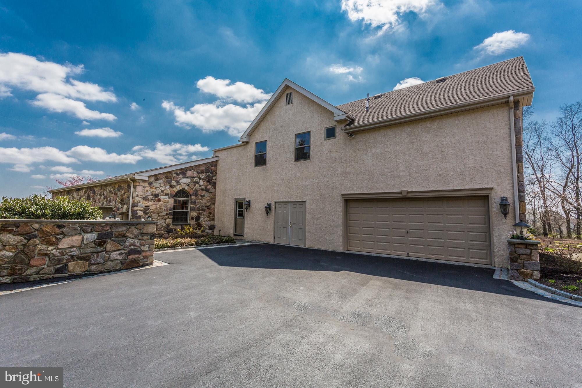 2565 Cold Spring Road Lansdale, PA 19446 - Photo 53 of 61 a view of a house with a yard