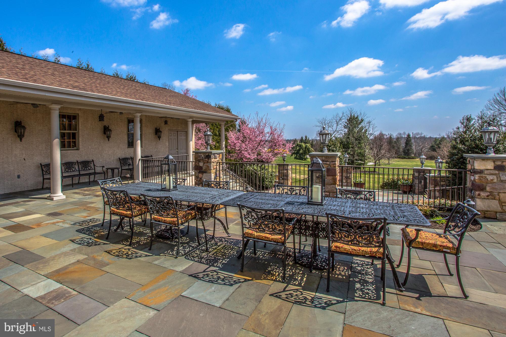 2565 Cold Spring Road Lansdale, PA 19446 - Photo 54 of 61 a view of a patio with a table and chairs