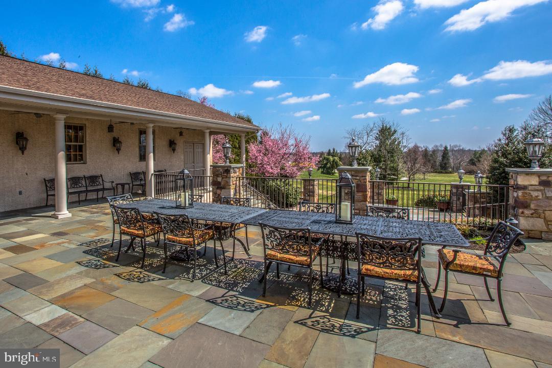 2565 Cold Spring Road Lansdale, PA 19446 - Photo 57 of 61 a view of a patio with a table and chairs