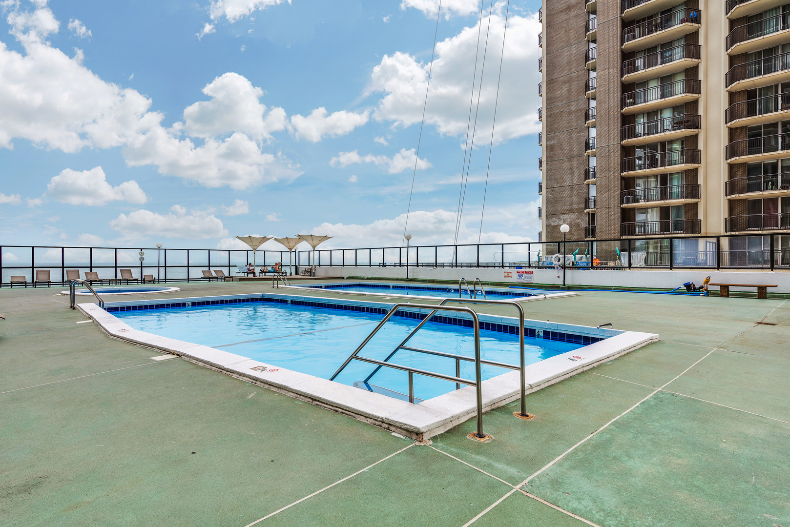 6033 North Sheridan Road, Unit 18K Chicago, IL 60660 - Photo 36 of 36 a view of a swimming pool with a terrace