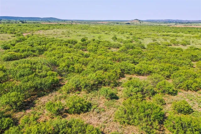 a view of a lake with a mountain