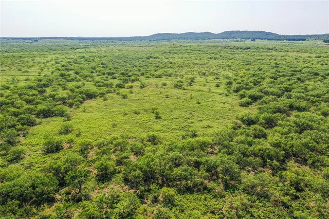 a view of an outdoor space and a mountain view