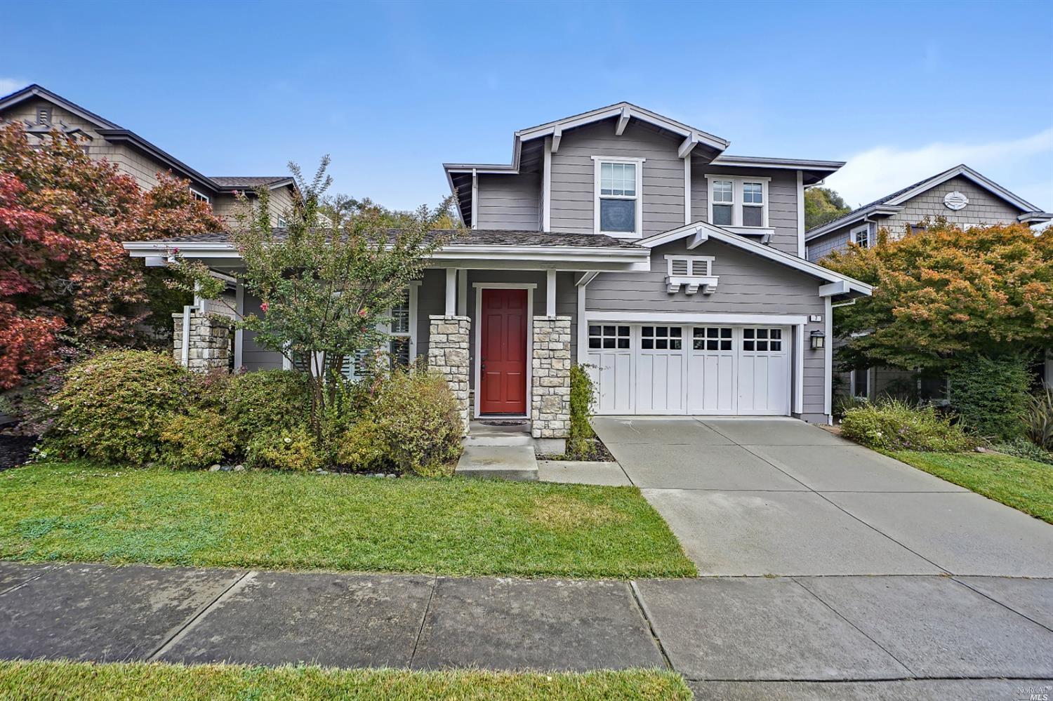 7 Hollyleaf Way Novato, CA 94949 - Photo 1 of 1 a front view of a house with a yard and garage