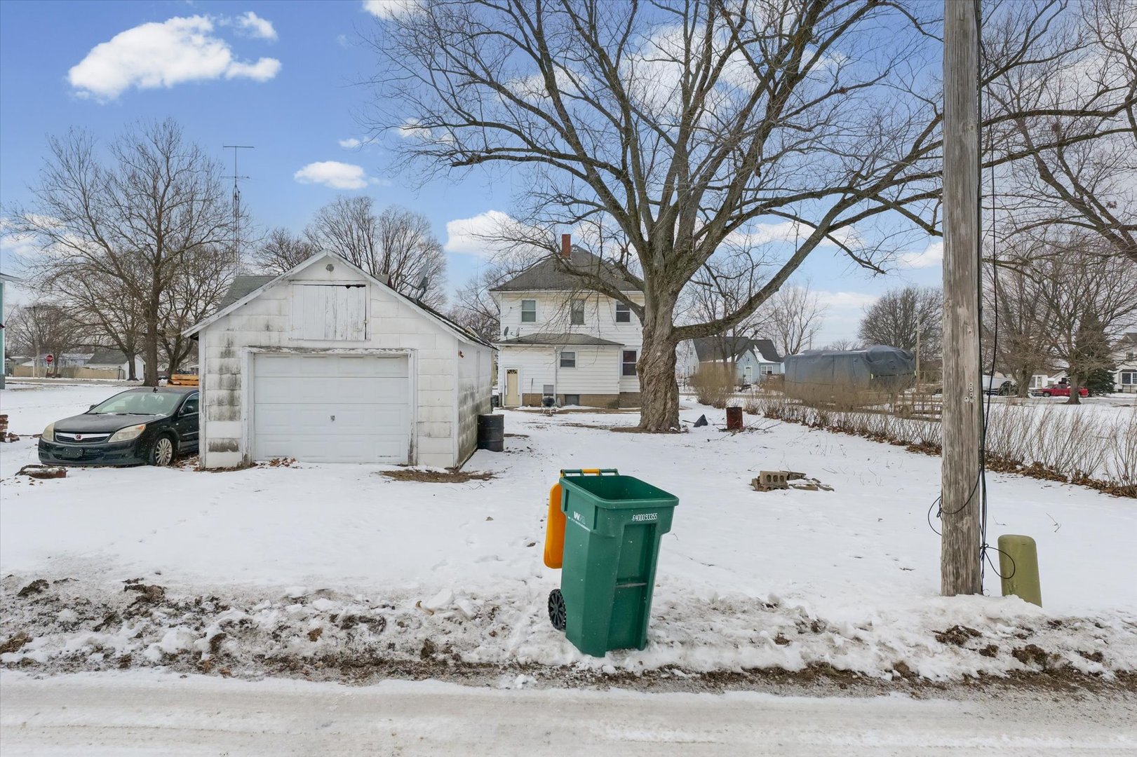 209 North Green Street Melvin, IL 60952 - Photo 23 of 24 a view of a house with a snow in the yard