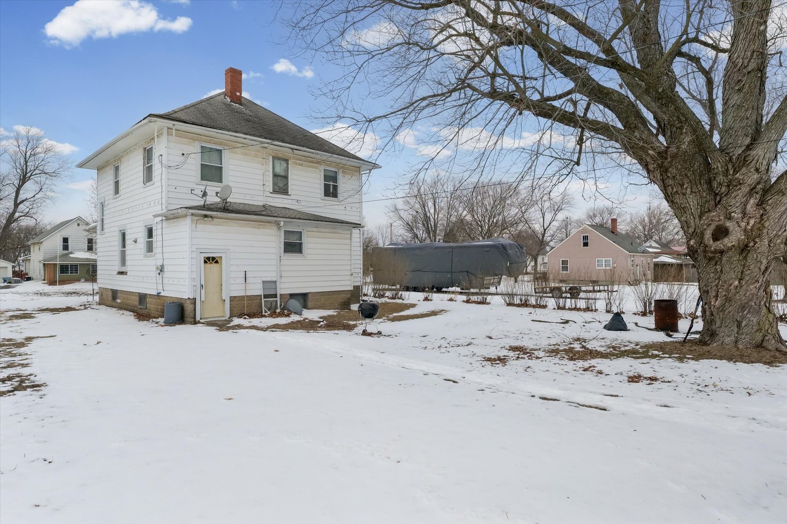 209 North Green Street Melvin, IL 60952 - Photo 24 of 24 a view of a house with a snow