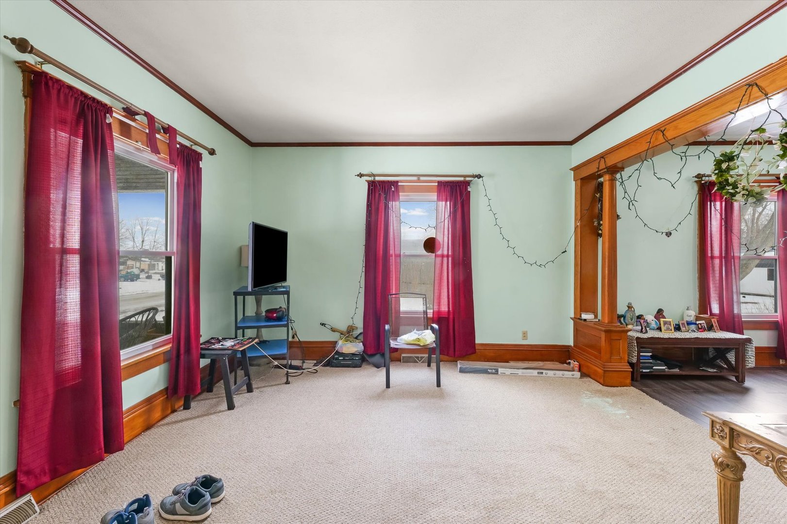 209 North Green Street Melvin, IL 60952 - Photo 5 of 24 a living room with furniture and a flat screen tv