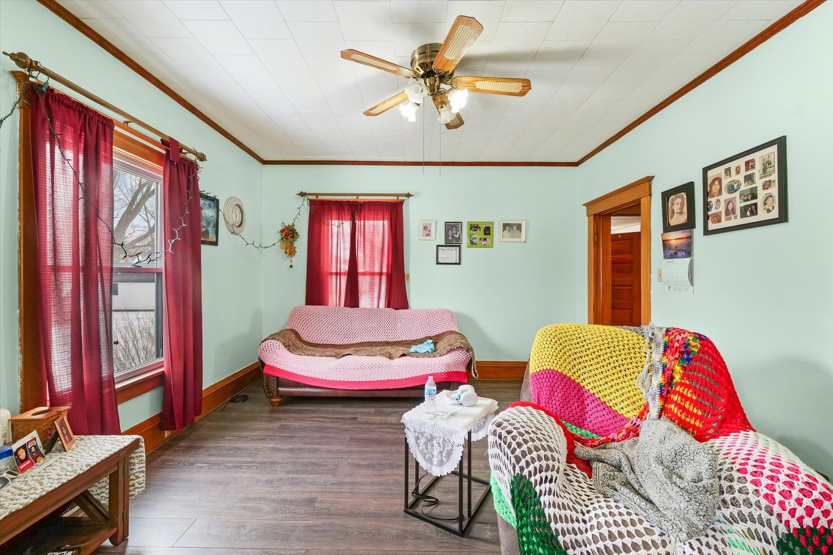 209 North Green Street Melvin, IL 60952 - Photo 7 of 24 a bedroom with two beds and a chandelier