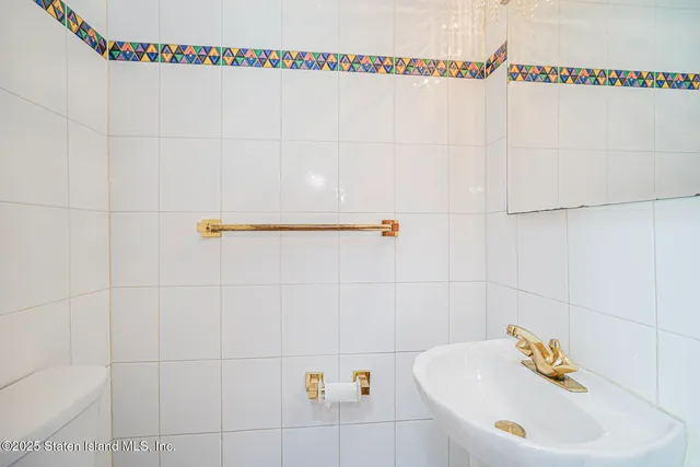 a bathroom with a sink and a shower