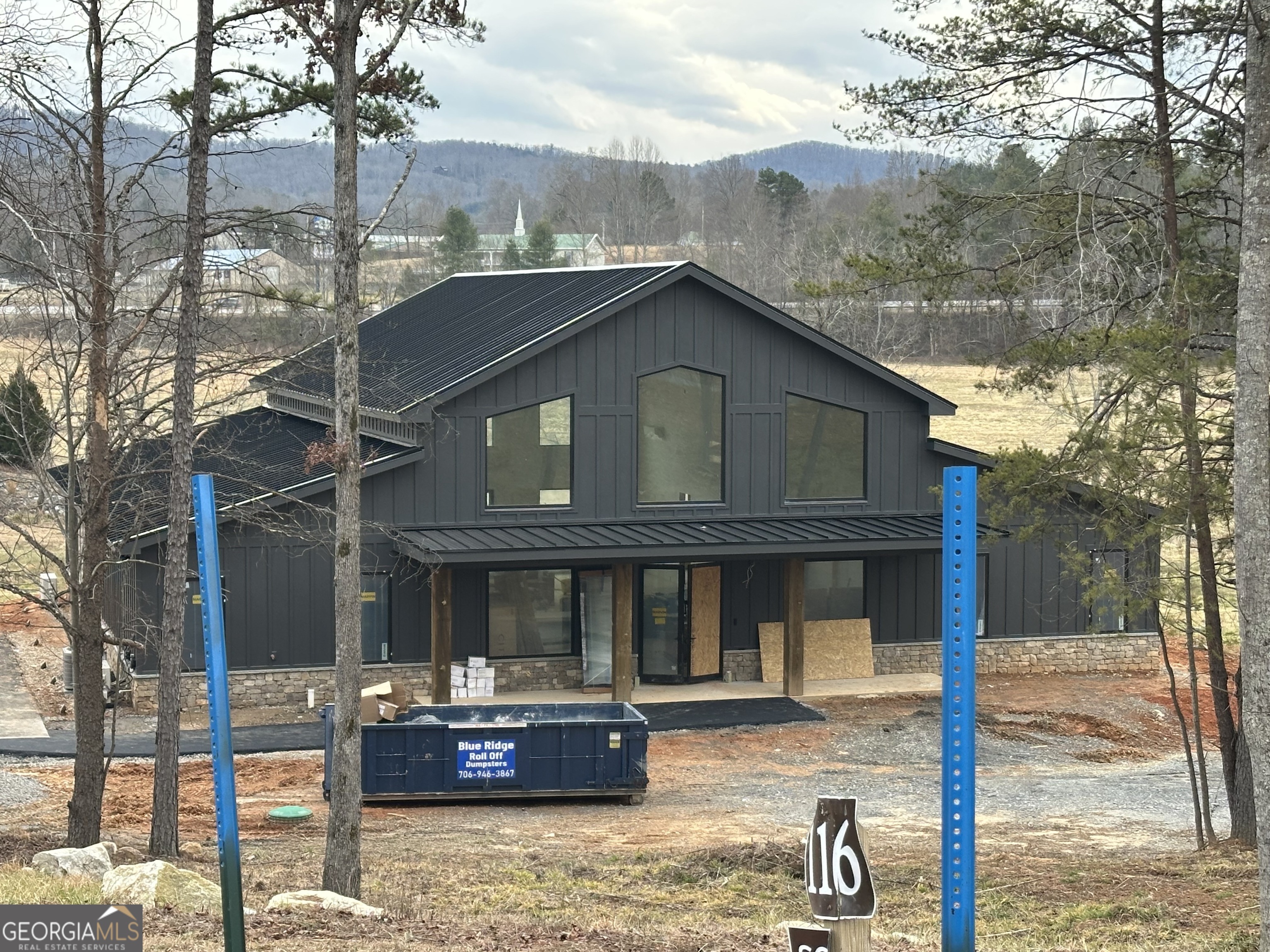 0 Ridge Drive, Unit LOT #27 Morganton, GA 30560 - Photo 15 of 15 a front view of a house with garden