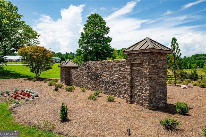 0 Ridge Drive, Unit LOT #27 Morganton, GA 30560 - Photo 7 of 13 a front view of a house with a yard