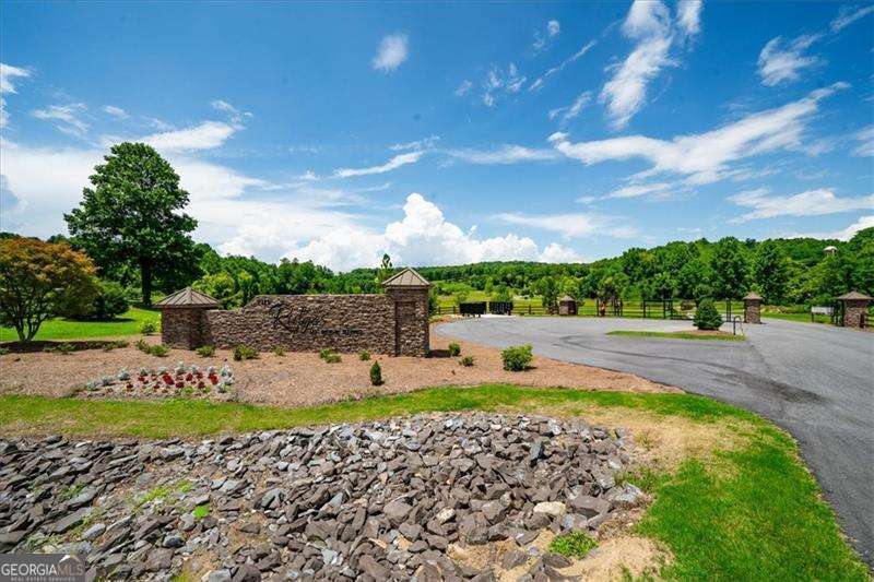 0 Ridge Drive, Unit LOT #27 Morganton, GA 30560 - Photo 8 of 13 a view of a swimming pool with a yard