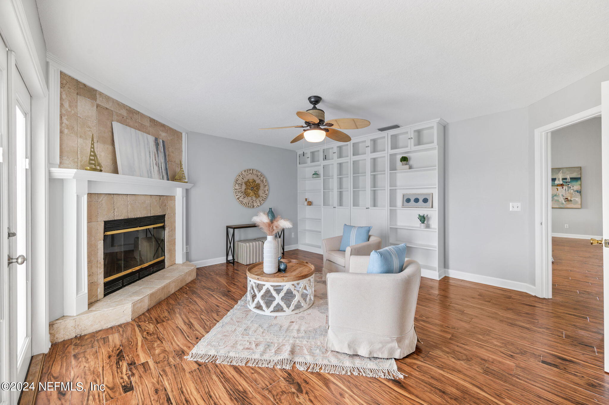 136 Beachside Drive Ponte Vedra Beach, FL 32082 - Photo 13 of 23 a living room with furniture and a fireplace