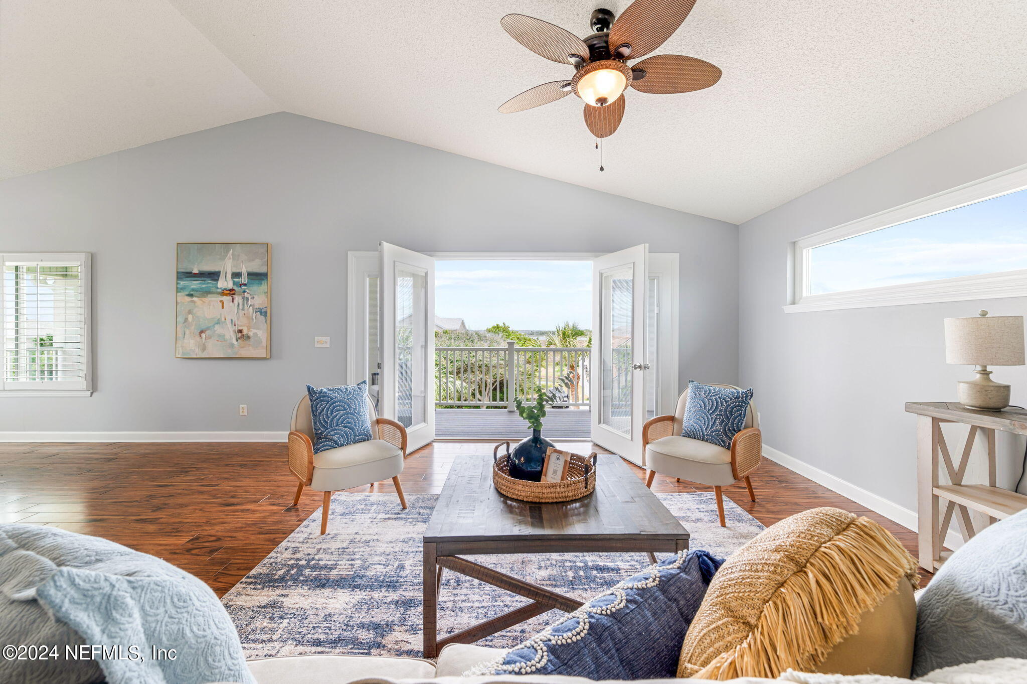 136 Beachside Drive Ponte Vedra Beach, FL 32082 - Photo 7 of 23 a living room with furniture and a large window