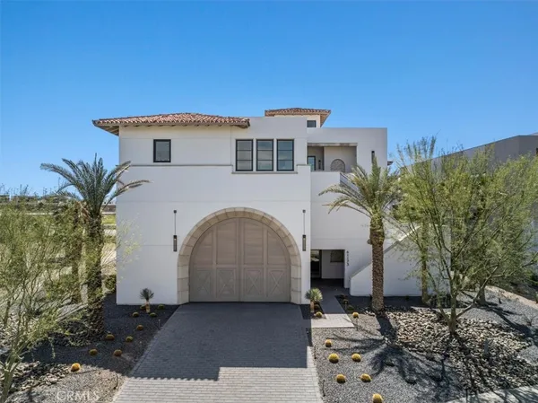 a house view with a backyard space