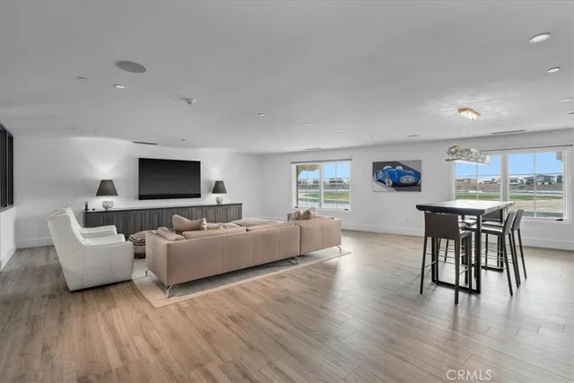 a view of a hallway with a living room