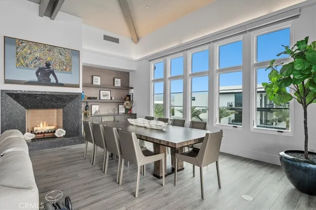 a bathroom with a granite countertop toilet sink and mirror