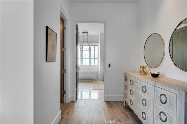 a kitchen with granite countertop a stove a sink and a microwave