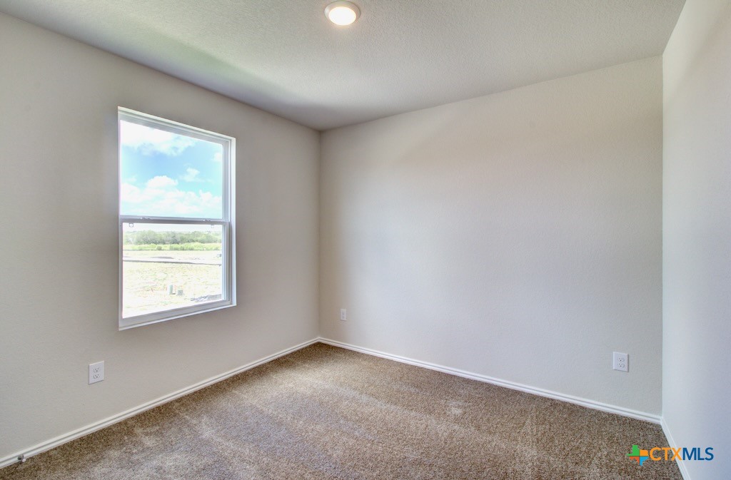 11242 Prairie Landing Converse, TX 78109 - Photo 23 of 24 an empty room with a window