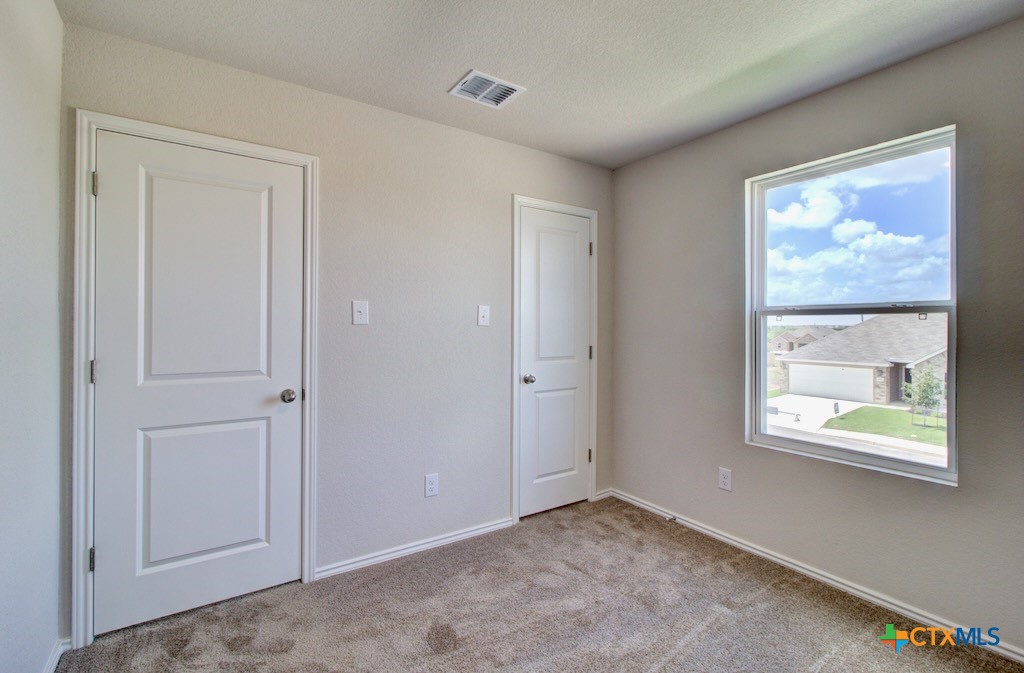 11242 Prairie Landing Converse, TX 78109 - Photo 24 of 24 a view of an empty room with a window