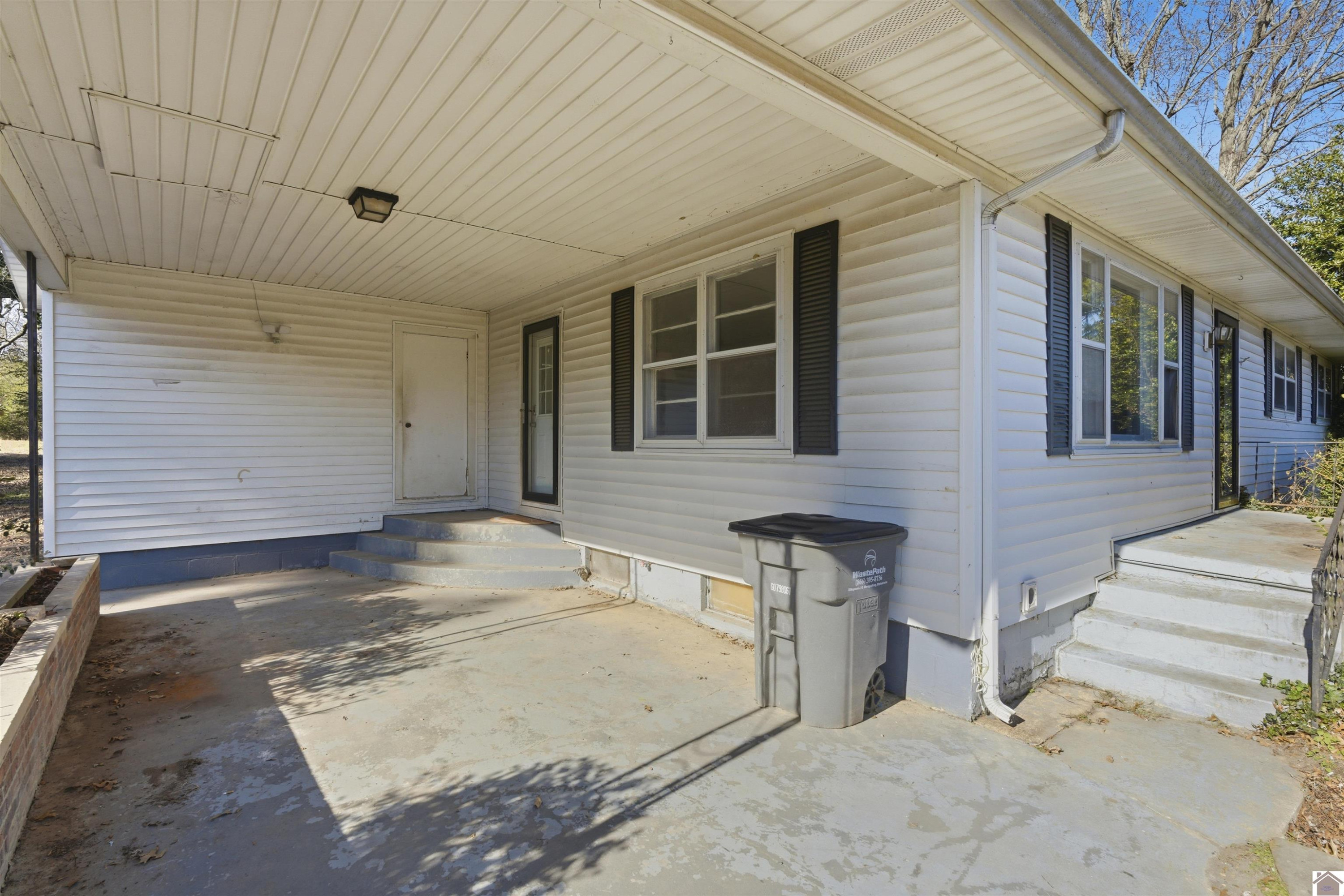 5045 Contest Road Paducah, KY 42001 - Photo 23 of 39 Attached Carport w/ Storage