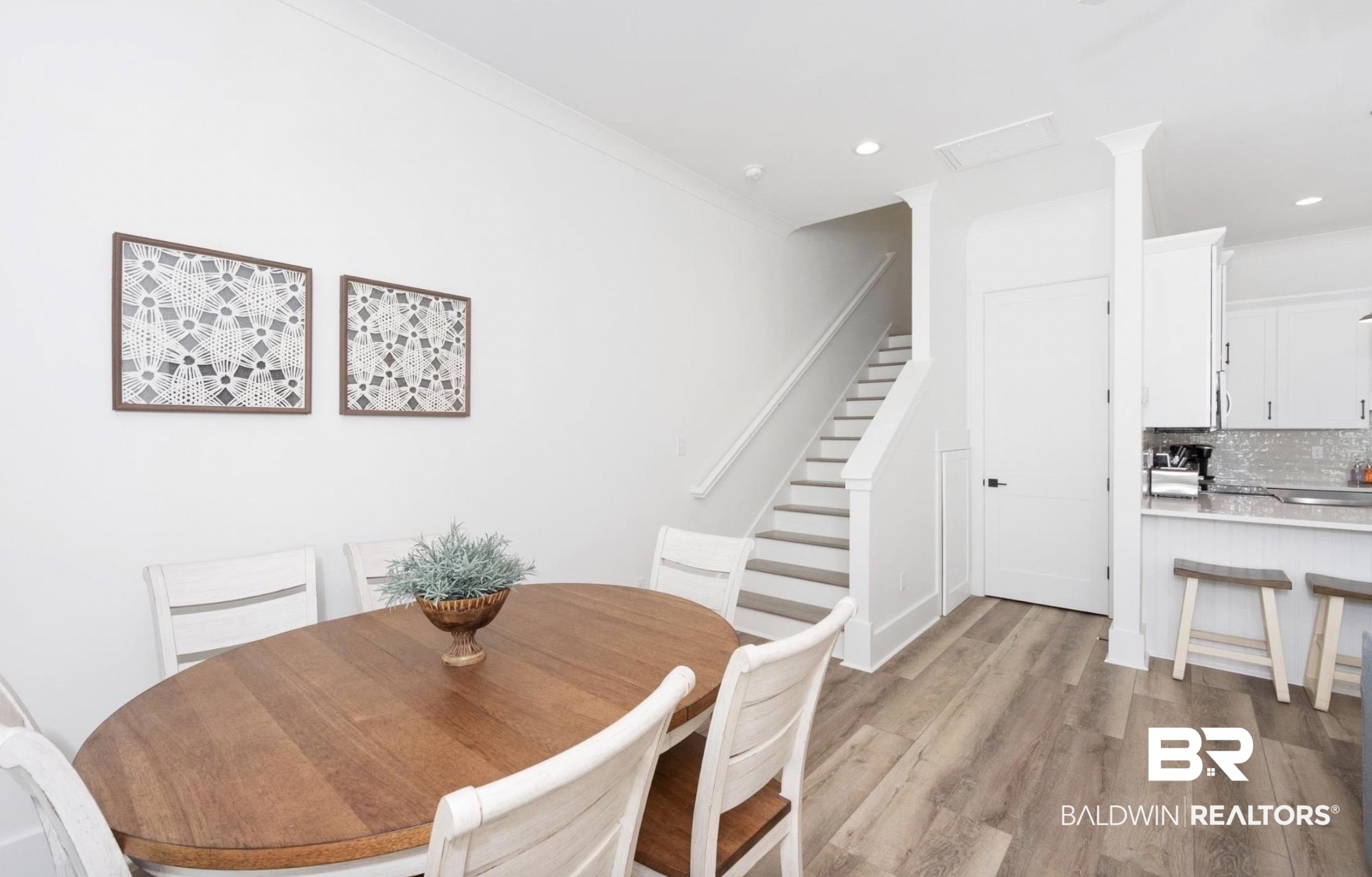 20 West Gate Orange Beach, AL 36561 - Photo 5 of 15 Dining room with light wood-style floors and recessed lighting