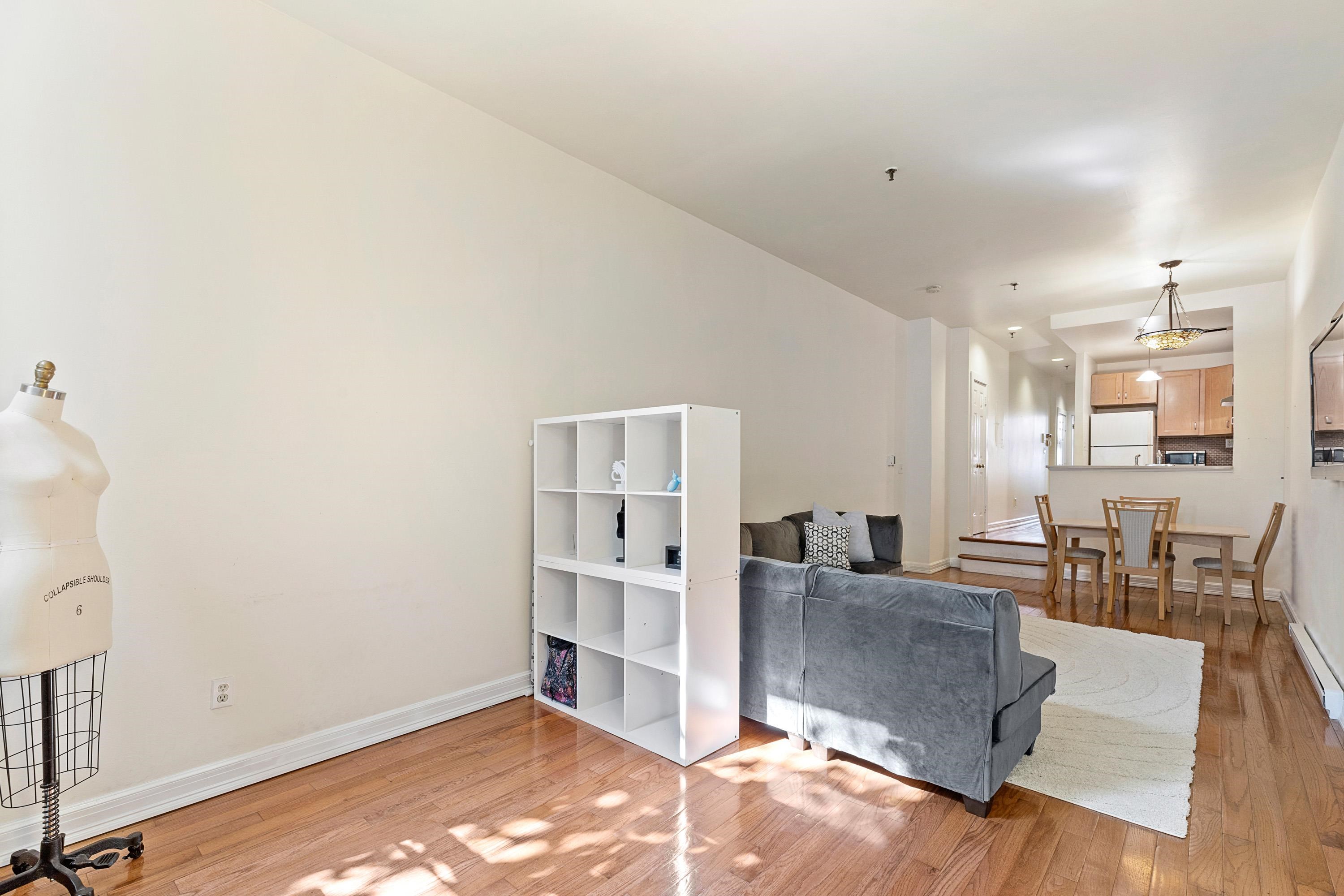 73 Madison Street, Unit 1N Hoboken, NJ 07030 - Photo 8 of 17 a living room with furniture