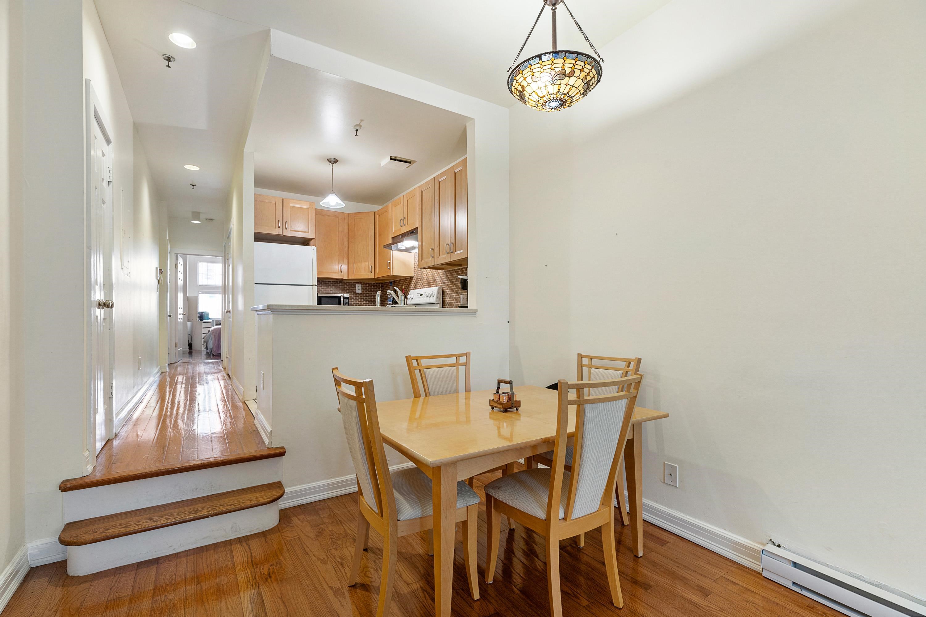 73 Madison Street, Unit 1N Hoboken, NJ 07030 - Photo 10 of 17 a view of a dining room with furniture and wooden floor