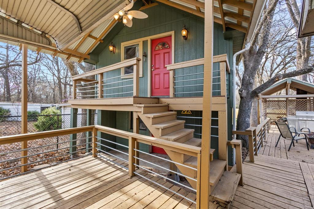1053 Paradise Cove Road Pottsboro, TX 75076 - Photo 14 of 35 Deck featuring stairs and area for grilling