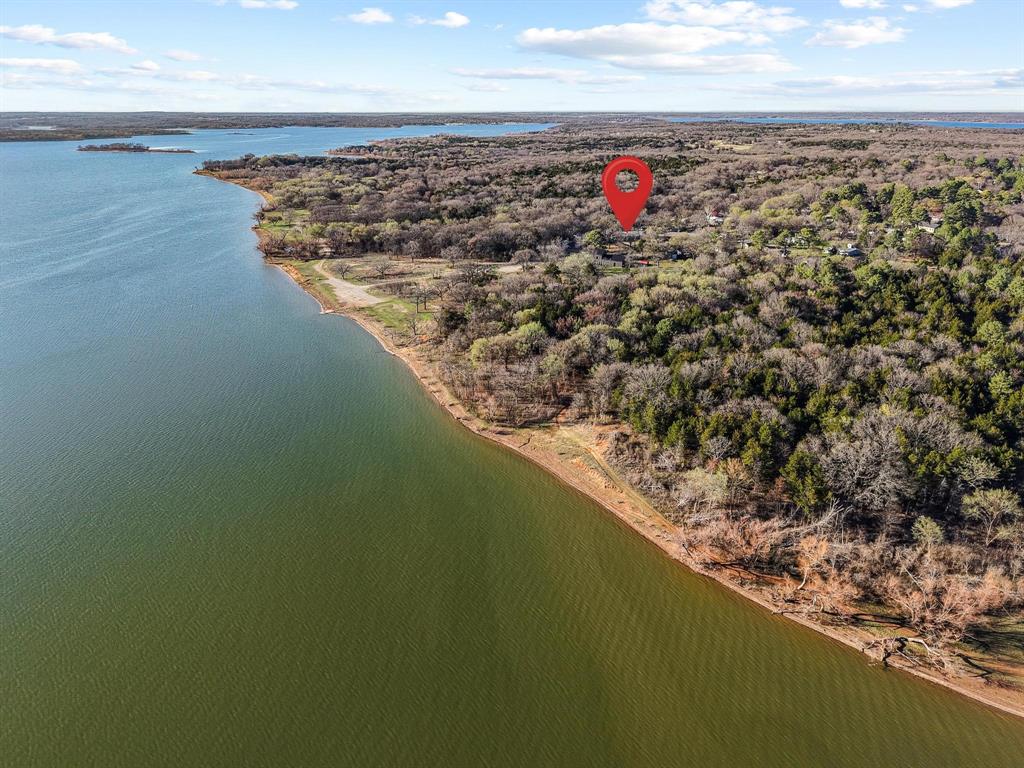1053 Paradise Cove Road Pottsboro, TX 75076 - Photo 2 of 35 Drone / aerial view of neighborhood beach shoreline
