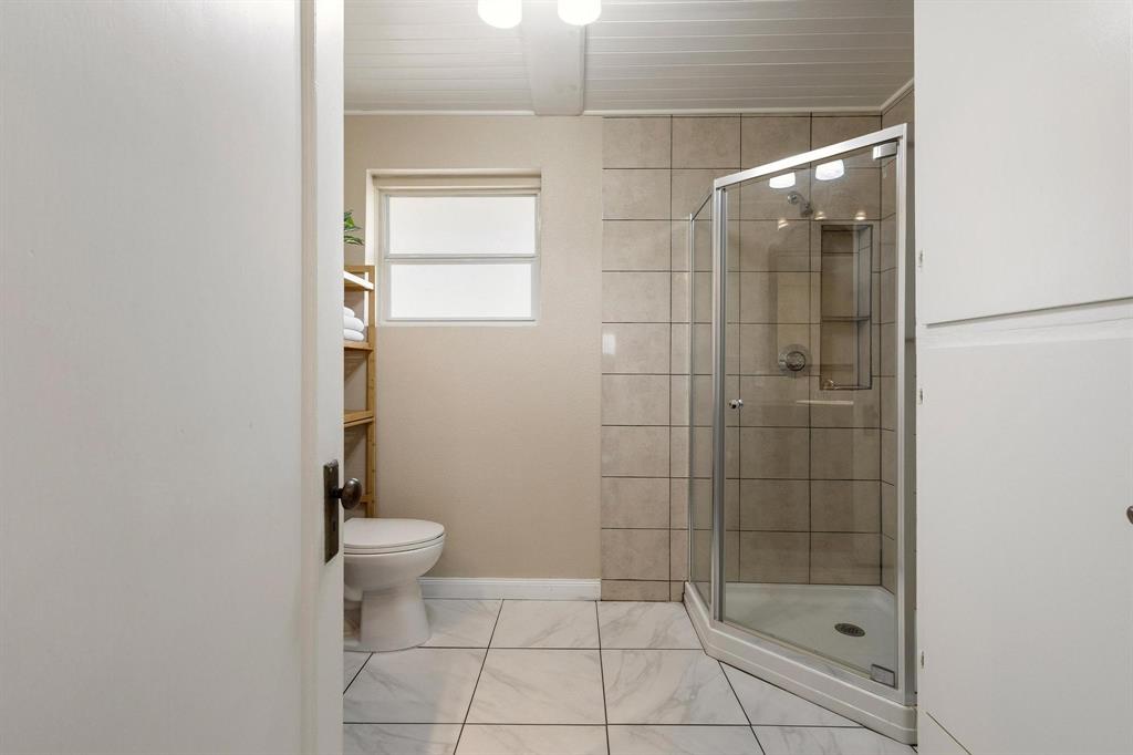 1053 Paradise Cove Road Pottsboro, TX 75076 - Photo 22 of 35 Shared bathroom with shower and built in storage