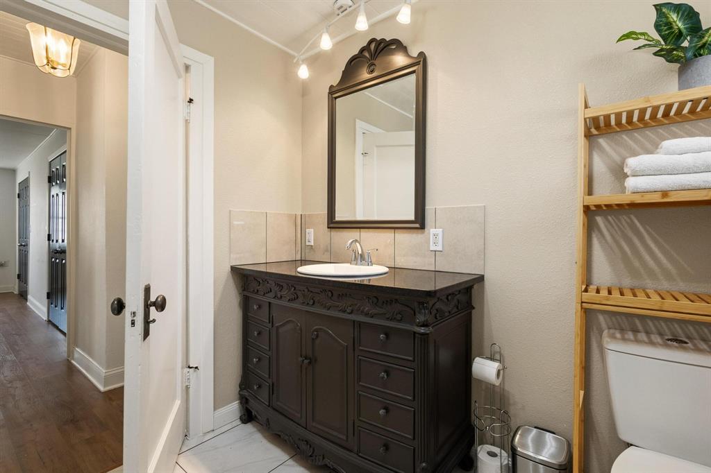 1053 Paradise Cove Road Pottsboro, TX 75076 - Photo 23 of 35 Shared bathroom with vanity