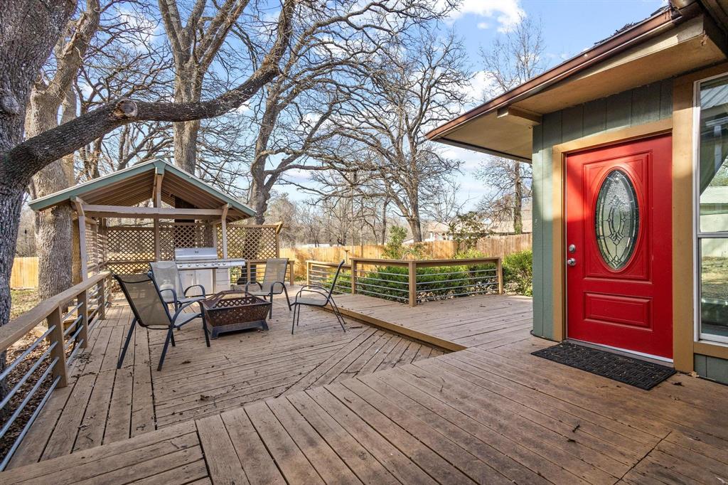 1053 Paradise Cove Road Pottsboro, TX 75076 - Photo 28 of 35 View of wooden terrace with fire pit