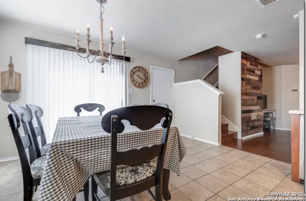a view of a dining room with furniture