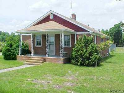 946 Ingleside Road Crewe, VA 23930 - Photo 1 of 1 a front view of a house with a yard